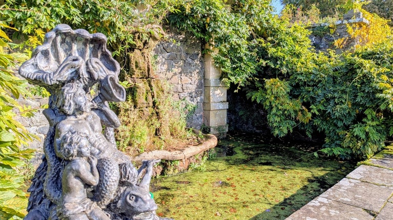 The fountain on the Croquet Terrace together with maquette of what the fountain would once have looked like.